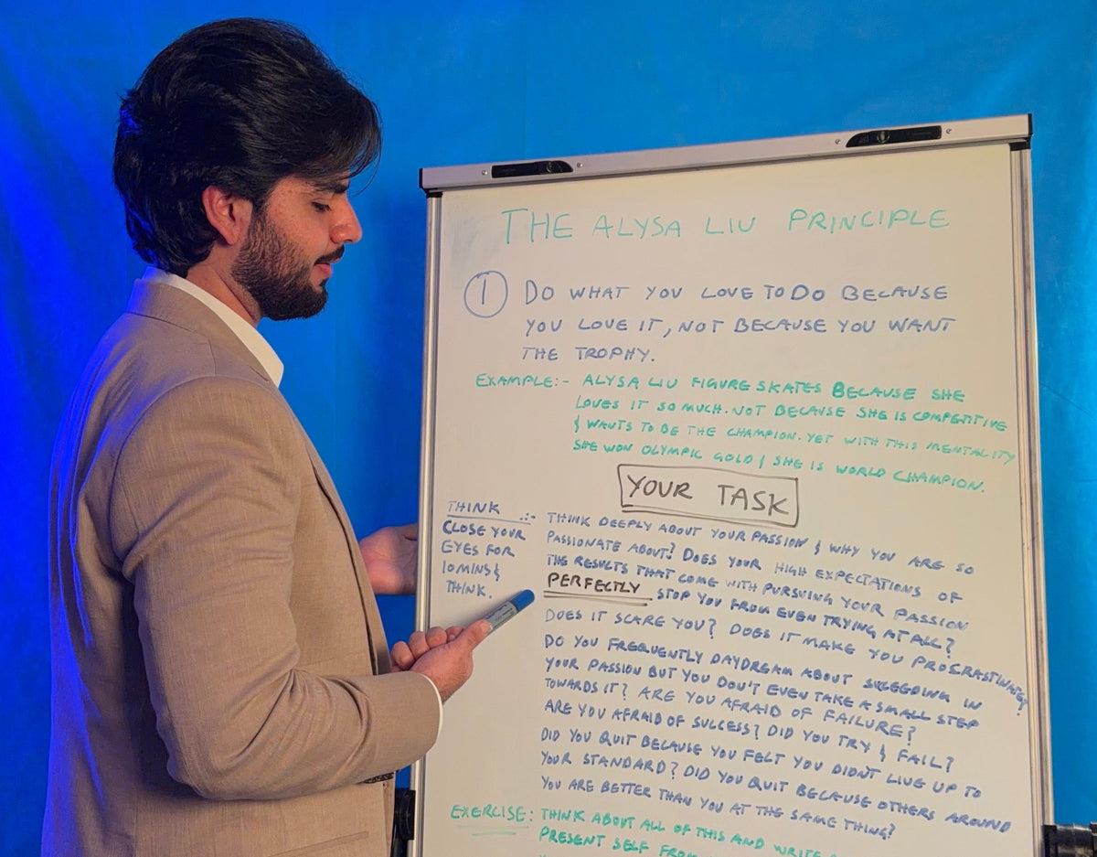 A student reading from the whiteboard during a session